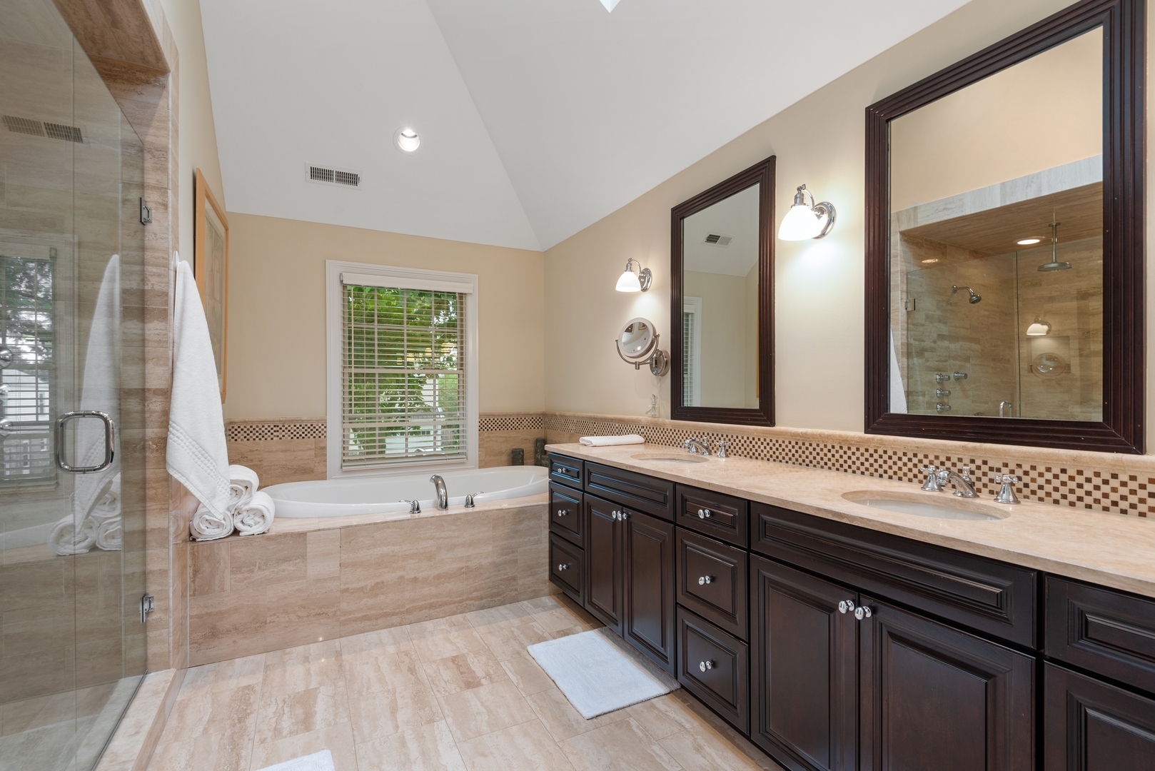 700 Harvard Street Wilmette, IL 60091 - Photo 25 of 50 a spacious bathroom with a tub sink and mirror