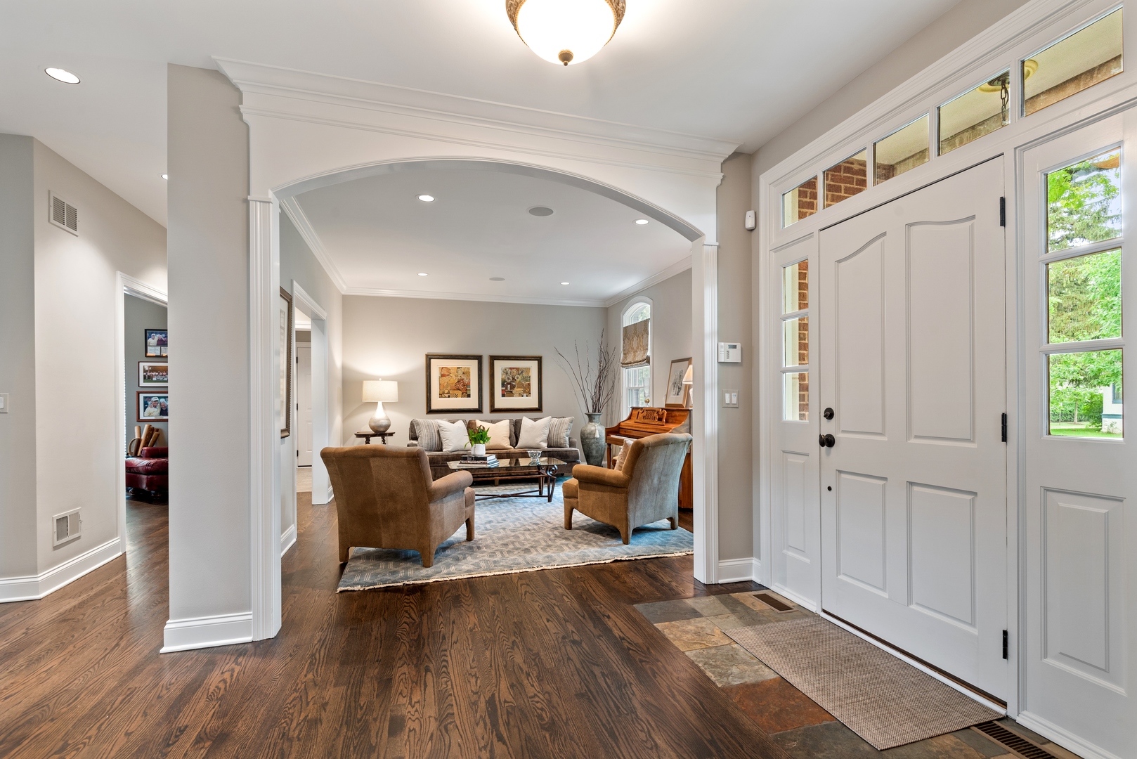 700 Harvard Street Wilmette, IL 60091 - Photo 3 of 50 a living room with furniture and a wooden floor