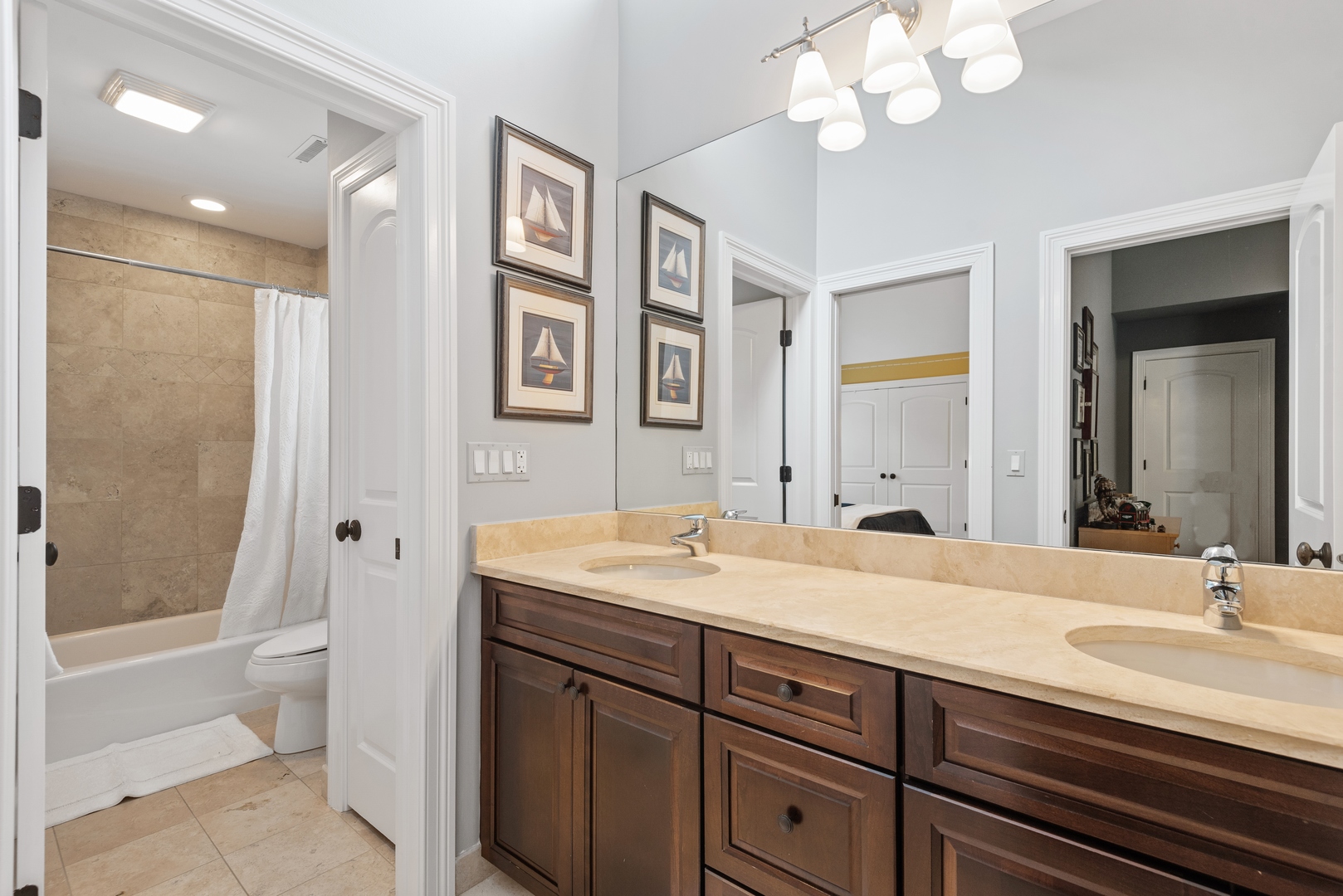 700 Harvard Street Wilmette, IL 60091 - Photo 31 of 50 a bathroom with a sink double vanity granite tub and a mirror