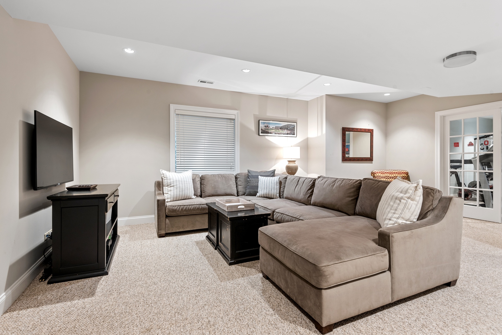 700 Harvard Street Wilmette, IL 60091 - Photo 33 of 50 a living room with furniture and a flat screen tv