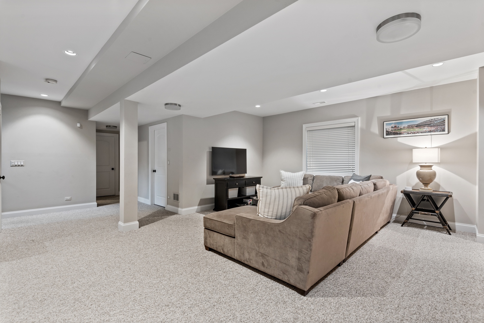 700 Harvard Street Wilmette, IL 60091 - Photo 34 of 50 a living room with furniture and a flat screen tv