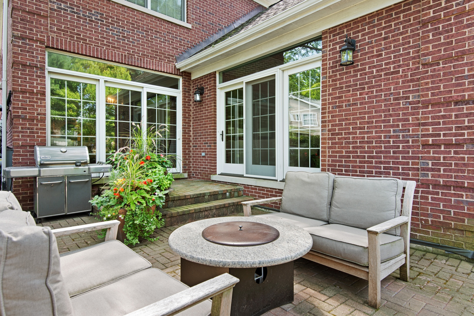700 Harvard Street Wilmette, IL 60091 - Photo 43 of 50 a view of a patio with couches table and chairs