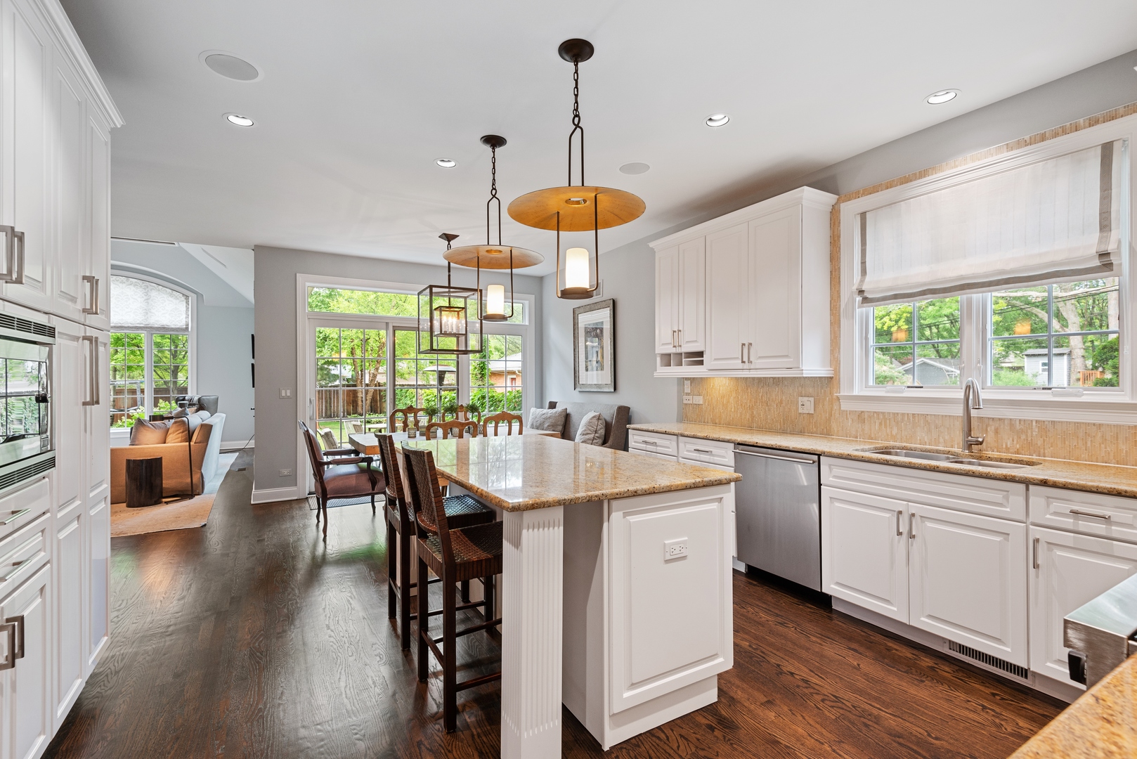 700 Harvard Street Wilmette, IL 60091 - Photo 10 of 50 a large kitchen with a table and chairs in it
