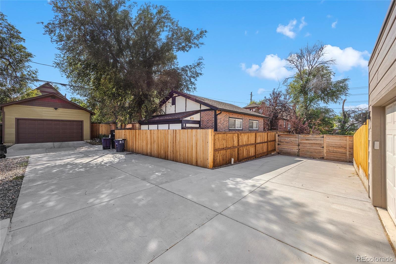 3420 Steele Street Denver, CO 80205 - Photo 39 of 50 a view of backyard with green space