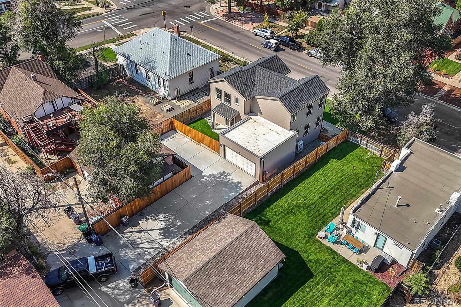 3420 Steele Street Denver, CO 80205 - Photo 41 of 50 an aerial view of a house with a garden