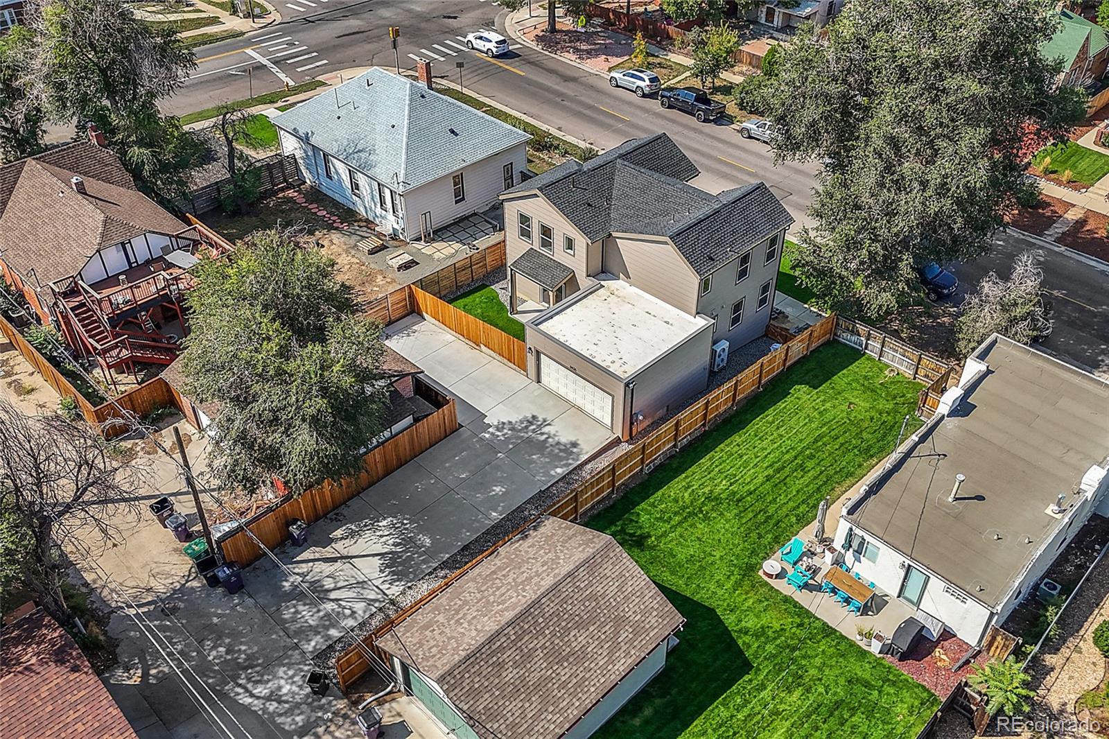 3420 Steele Street Denver, CO 80205 - Photo 42 of 50 an aerial view of a house with a garden