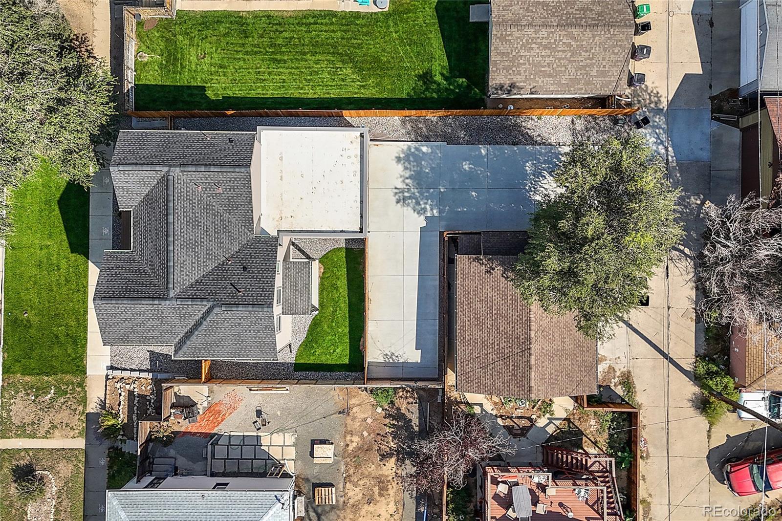 3420 Steele Street Denver, CO 80205 - Photo 43 of 50 an aerial view of a house with a yard