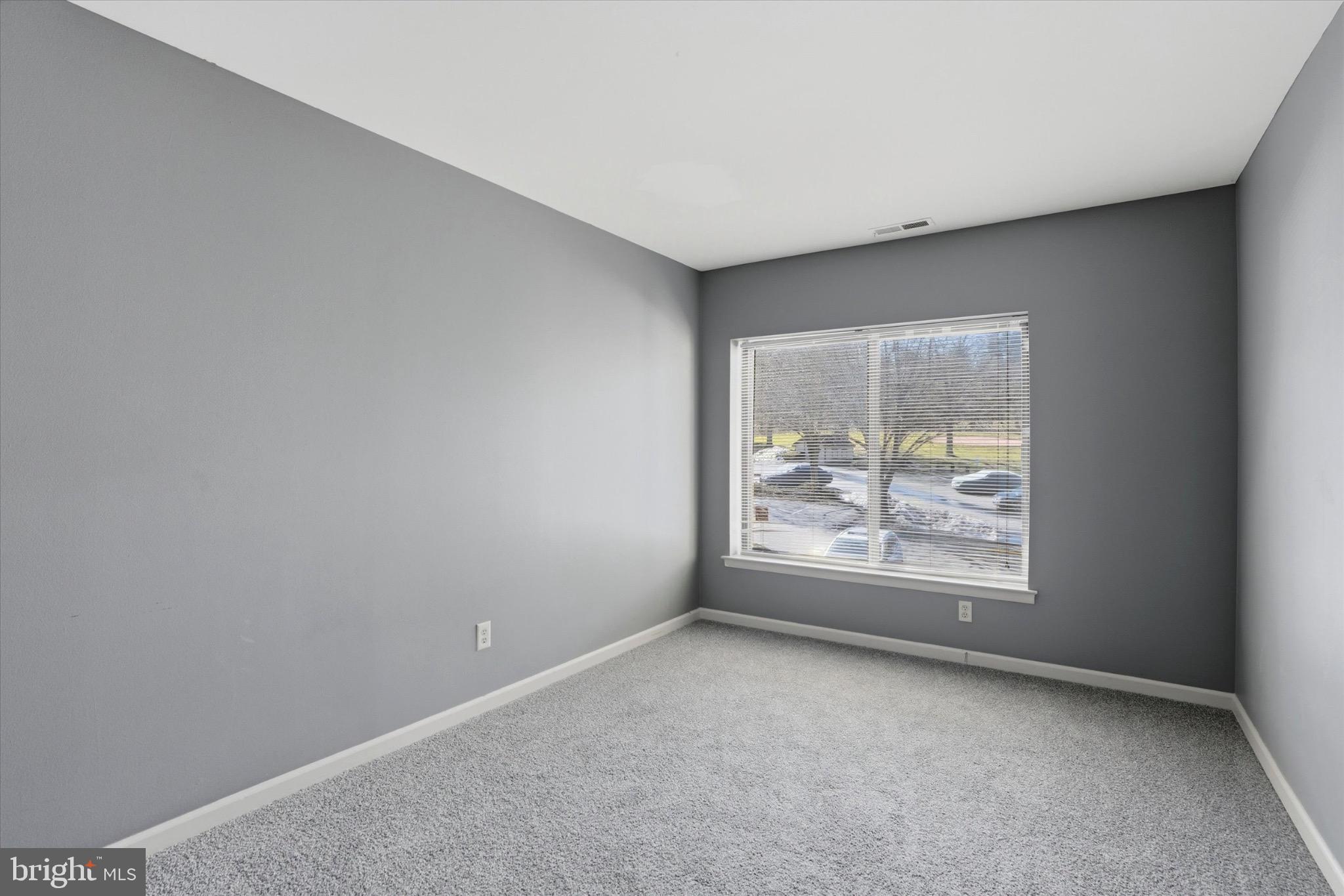 48 Muirfield Drive Reading, PA 19607 - Photo 13 of 15 an empty room with windows