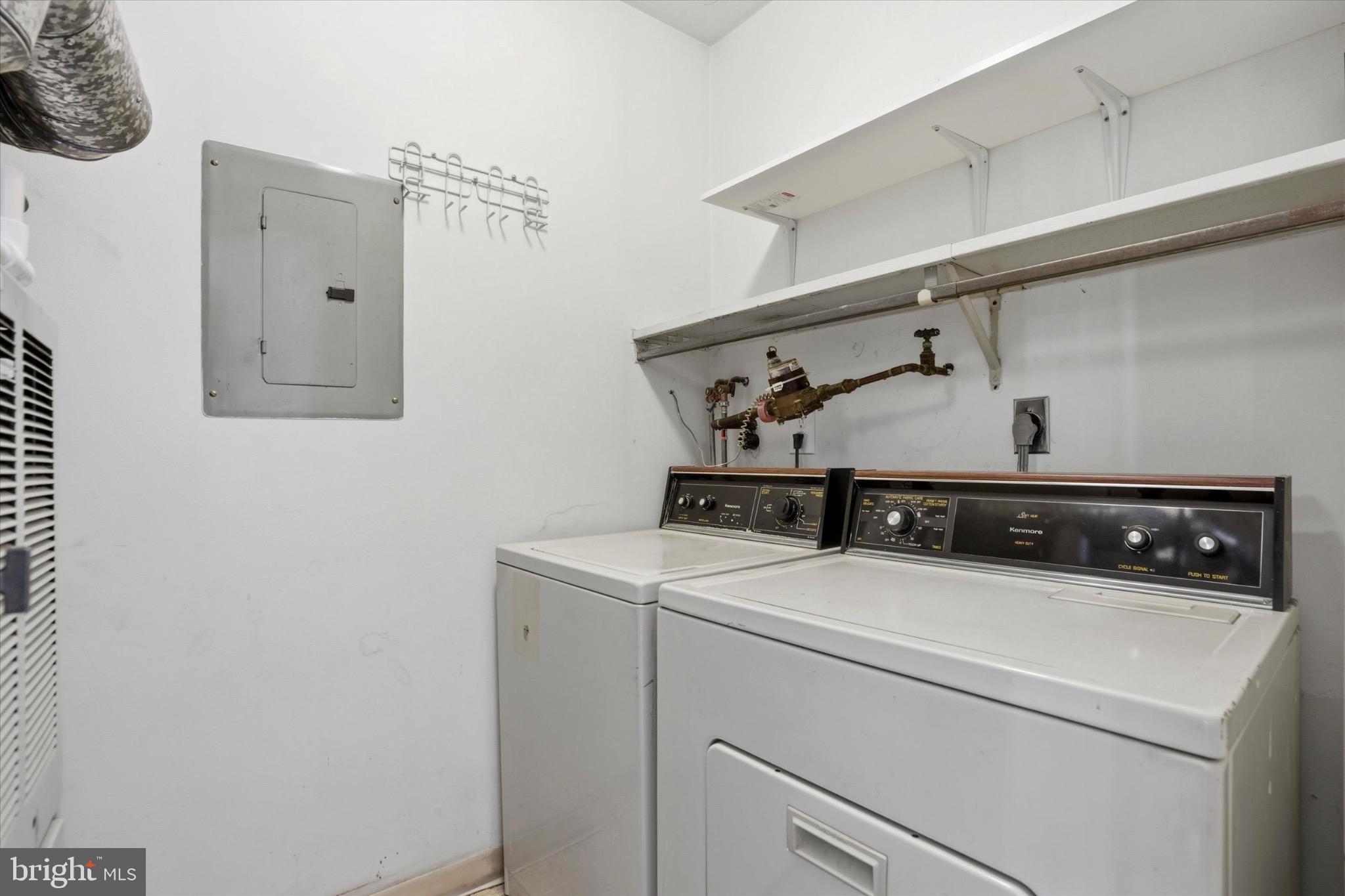 48 Muirfield Drive Reading, PA 19607 - Photo 14 of 15 a utility room with dryer and washer
