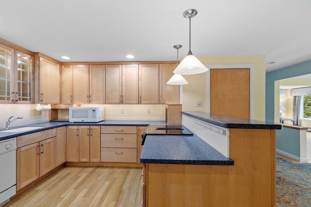 39 Island Road Lunenburg, MA 01462 - Photo 13 of 35 a kitchen with a sink and cabinets