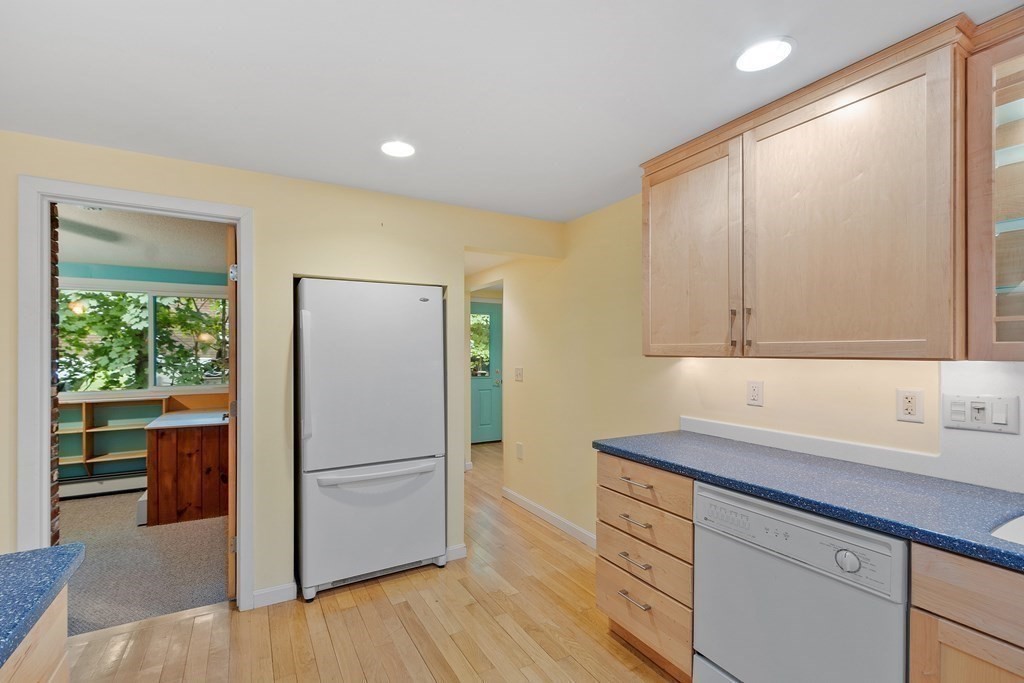 39 Island Road Lunenburg, MA 01462 - Photo 15 of 35 a kitchen with a refrigerator sink and cabinets