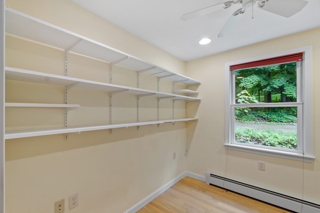 39 Island Road Lunenburg, MA 01462 - Photo 19 of 35 a view of a room with racks on the wall