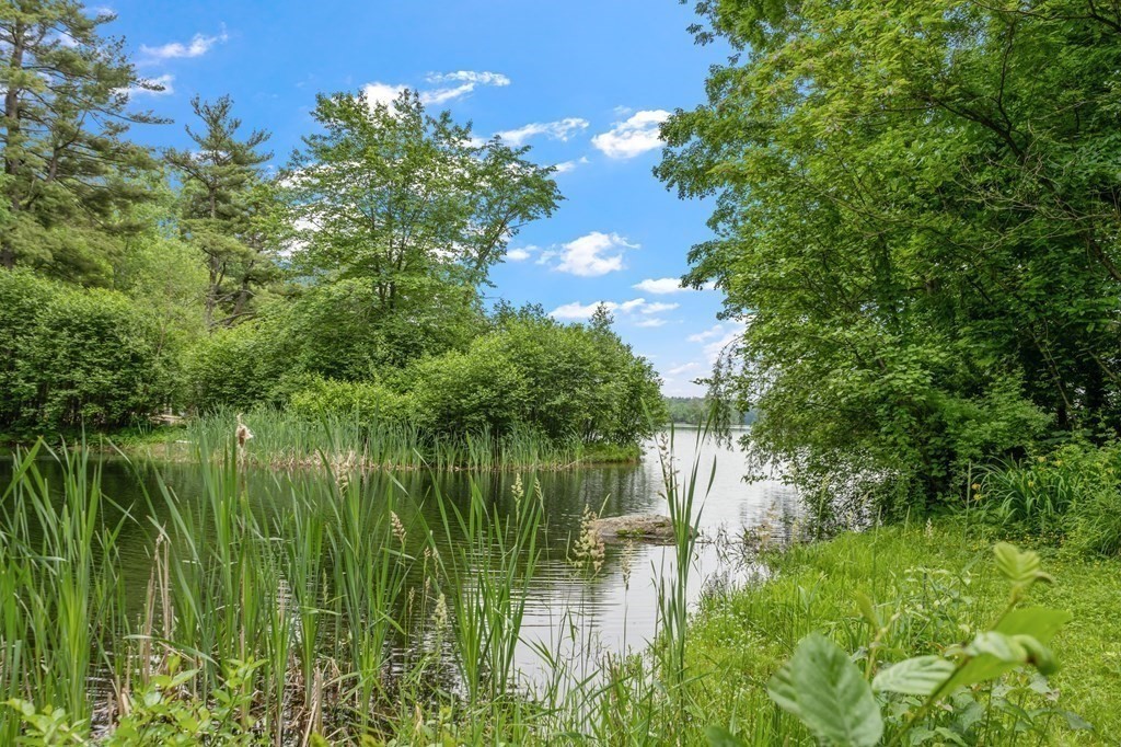 39 Island Road Lunenburg, MA 01462 - Photo 2 of 35 a lake view with a garden