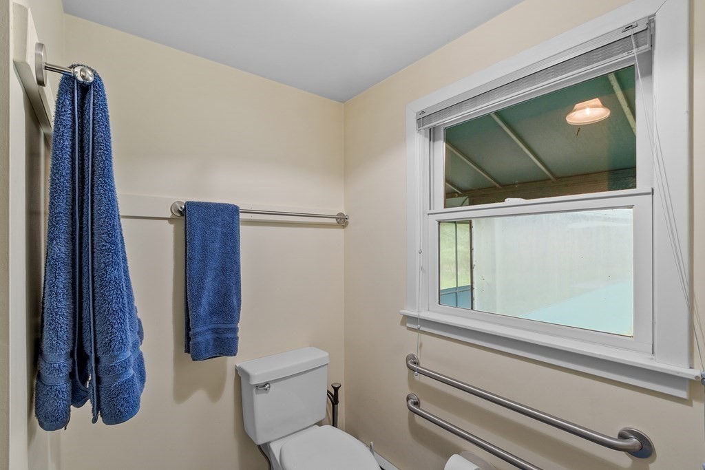 39 Island Road Lunenburg, MA 01462 - Photo 24 of 35 a bathroom with a toilet sink and mirror