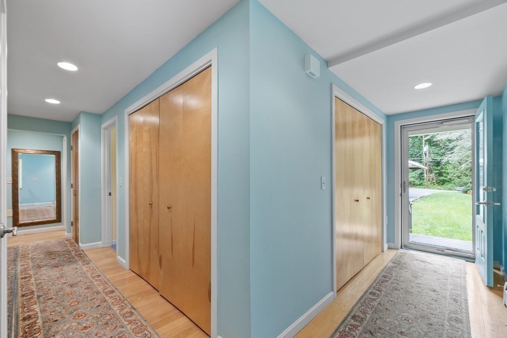 39 Island Road Lunenburg, MA 01462 - Photo 26 of 35 a view of hallway with a door and wooden floor