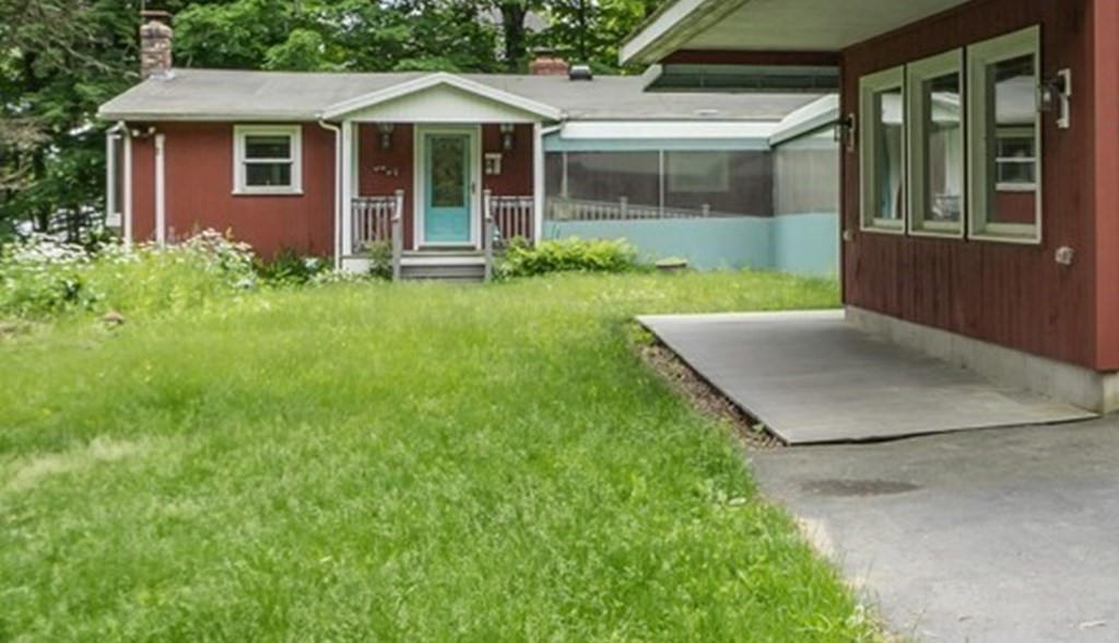 39 Island Road Lunenburg, MA 01462 - Photo 3 of 35 a front view of a house with garden