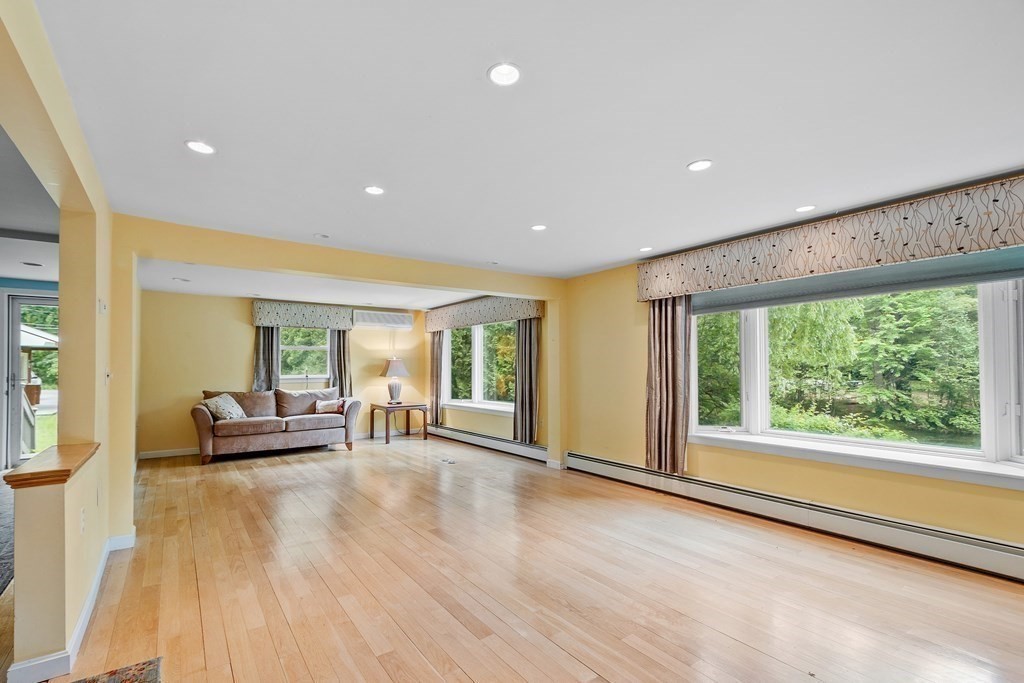 39 Island Road Lunenburg, MA 01462 - Photo 5 of 35 a living room with furniture and large windows