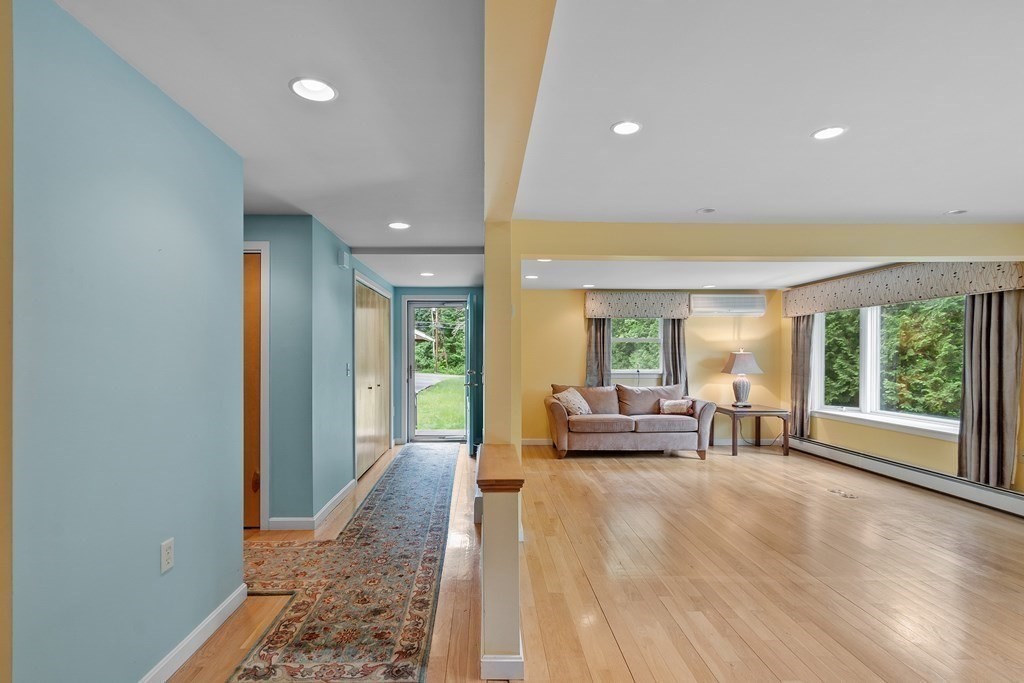 39 Island Road Lunenburg, MA 01462 - Photo 7 of 35 a living room with furniture and large windows