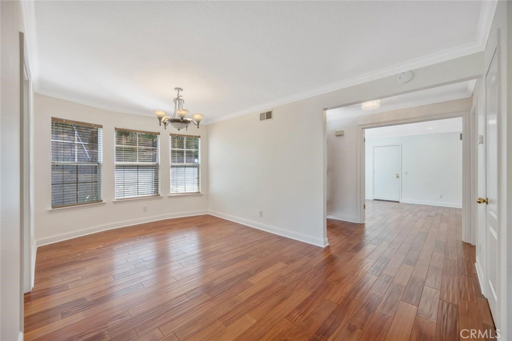 5974 Ruthwood Drive Calabasas, CA 91302 - Photo 7 of 30 wooden floor in an empty room with a window