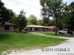 0 Burma Road New Smyrna Beach, FL 32168 - Photo 3 of 20 a view of a house with a garden