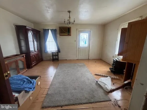 a view of livingroom with furniture and a window