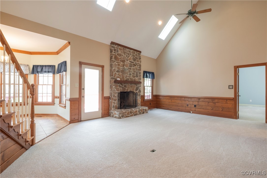 2770 Checketts Drive Sandy Hook, VA 23153 - Photo 20 of 50 an empty room with fireplace and windows