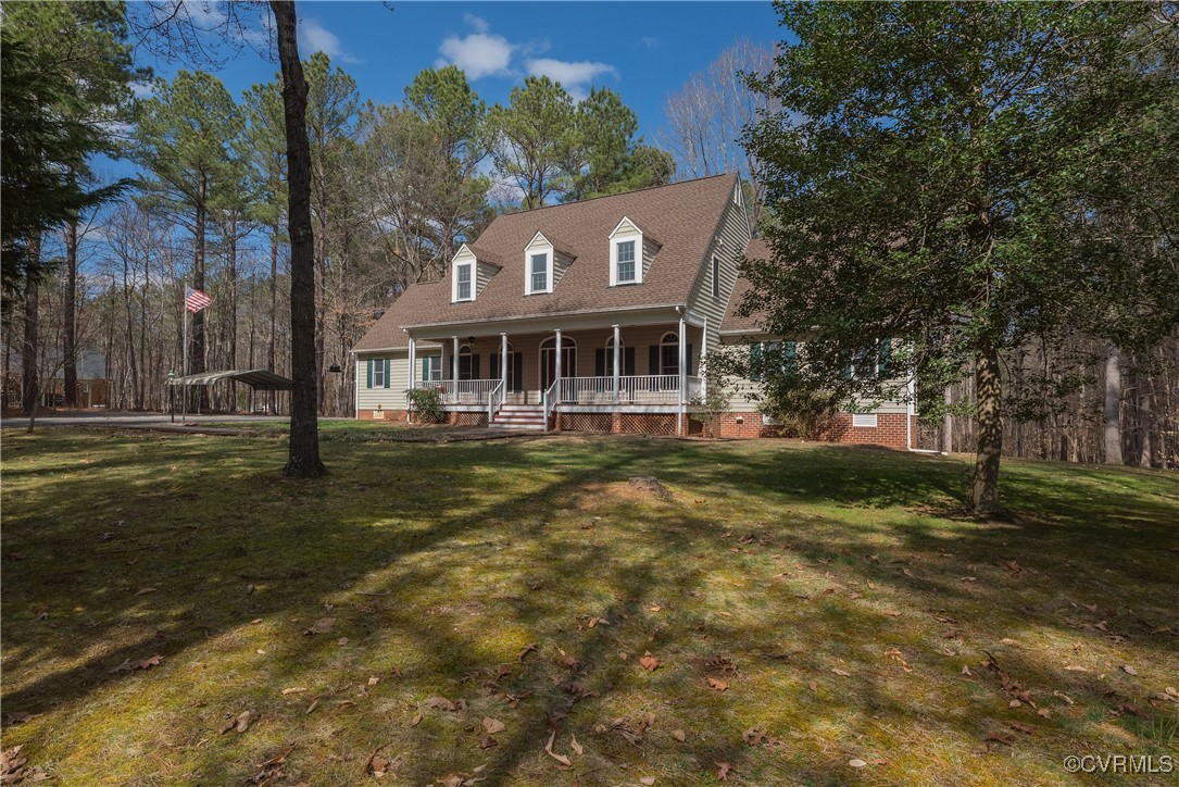 2770 Checketts Drive Sandy Hook, VA 23153 - Photo 2 of 50 a view of a house with a yard