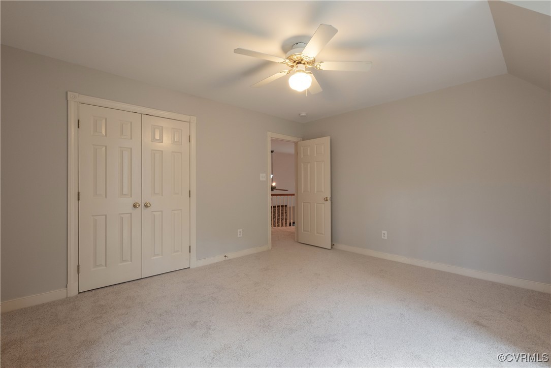 2770 Checketts Drive Sandy Hook, VA 23153 - Photo 39 of 50 an empty room with a ceiling fan and a window