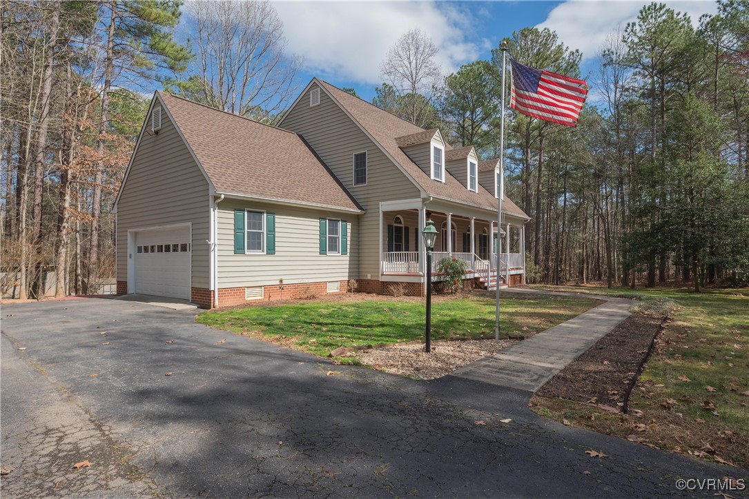 2770 Checketts Drive Sandy Hook, VA 23153 - Photo 5 of 50 a house that has a lot of plants in it