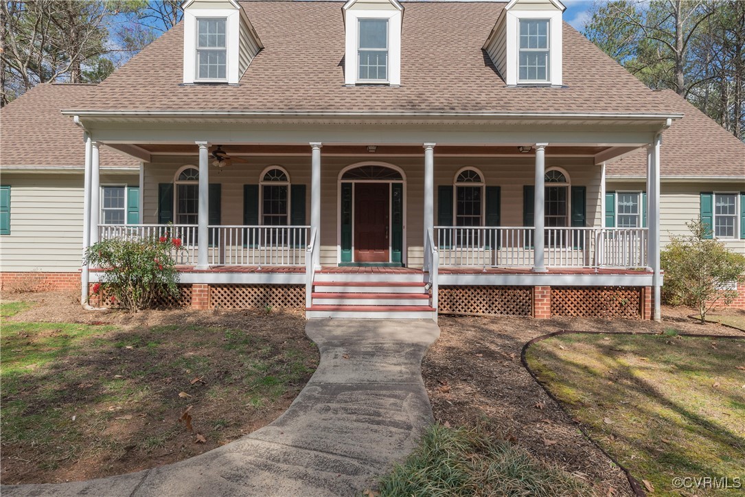 2770 Checketts Drive Sandy Hook, VA 23153 - Photo 7 of 50 a front view of a house with a yard