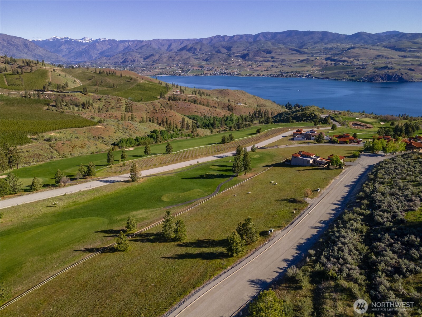 322 Paintbrush Road Chelan, WA 98816 - Photo 6 of 26 a view of a city with mountains in the background