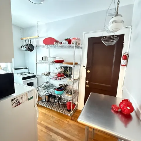 a room with furniture and a chandelier