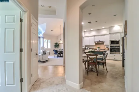 a view of a living room and a dining room