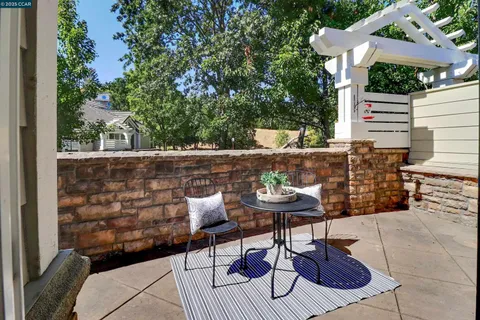 a view of outdoor seating area with furniture