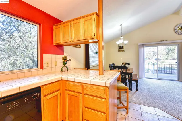 a bedroom with a bed and a lamp