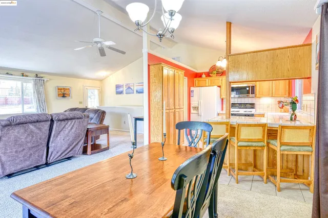 a view of a living room with a large window
