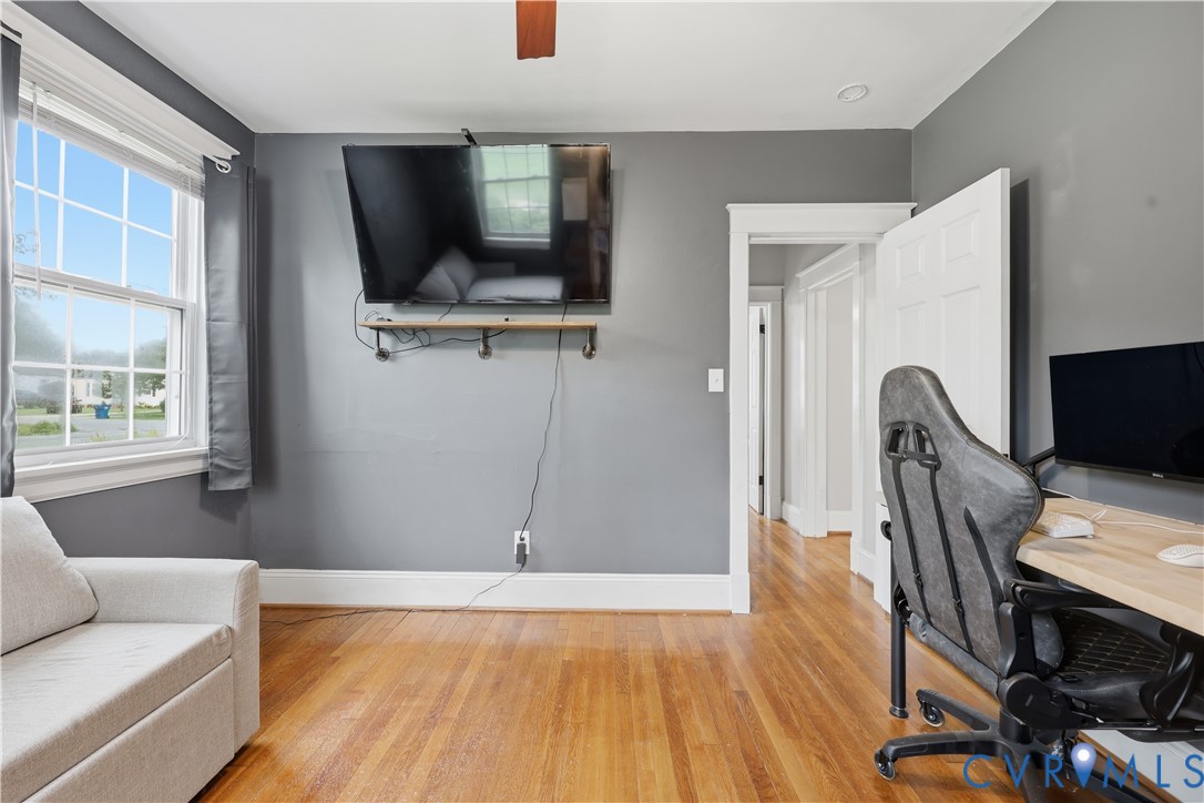 8077 Signal Hill Road Mechanicsville, VA 23111 - Photo 17 of 24 Hardwood flooring throughout, gray painted walls w