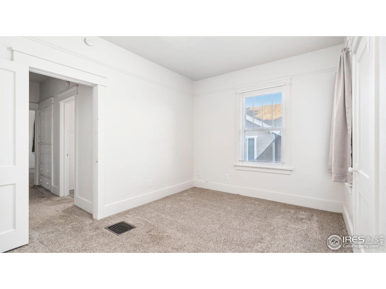 1029 Cranford Place Greeley, CO 80631 - Photo 16 of 34 a black and white photo of a living room