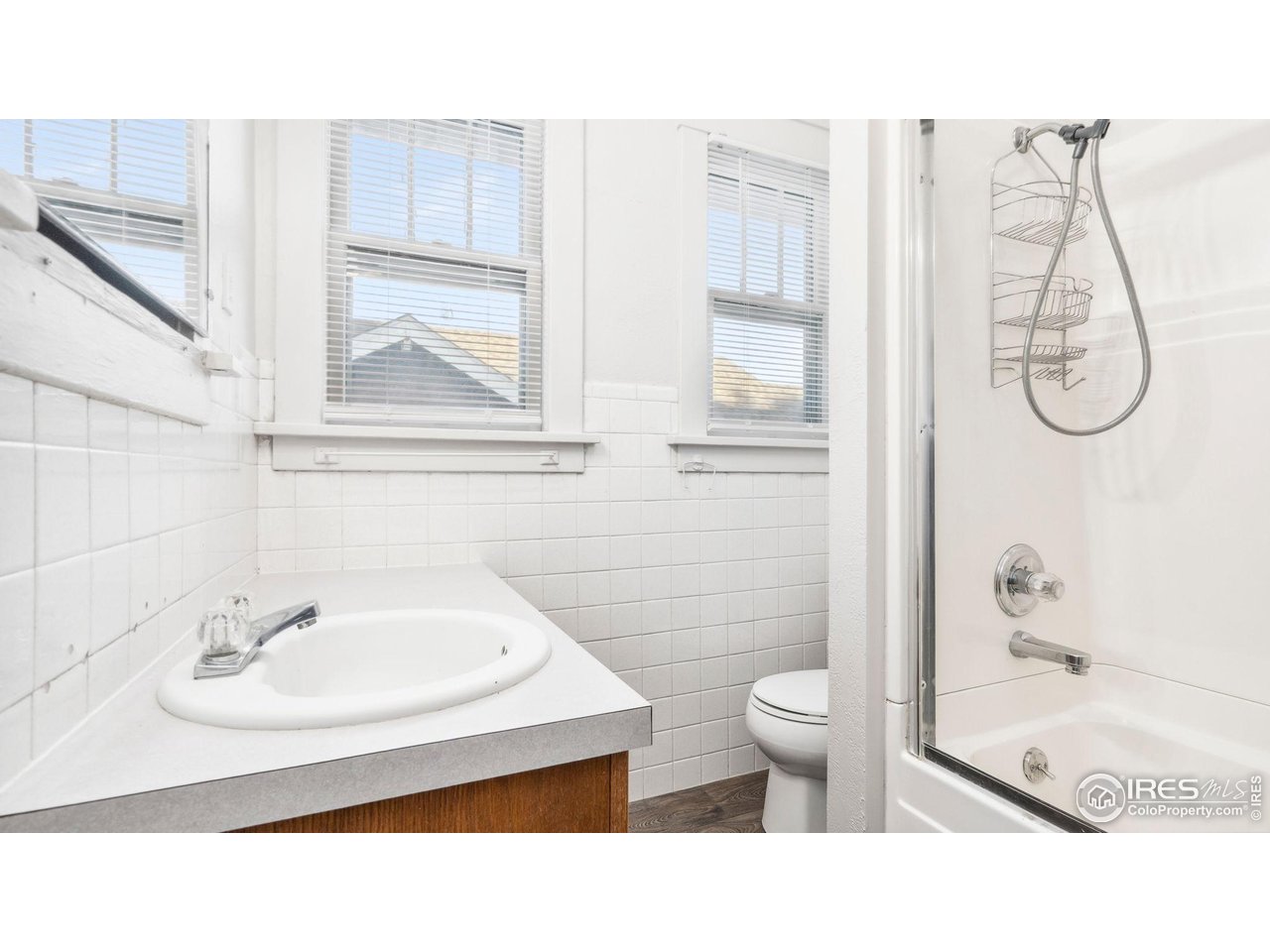 1029 Cranford Place Greeley, CO 80631 - Photo 17 of 34 a bathroom with a sink toilet and shower