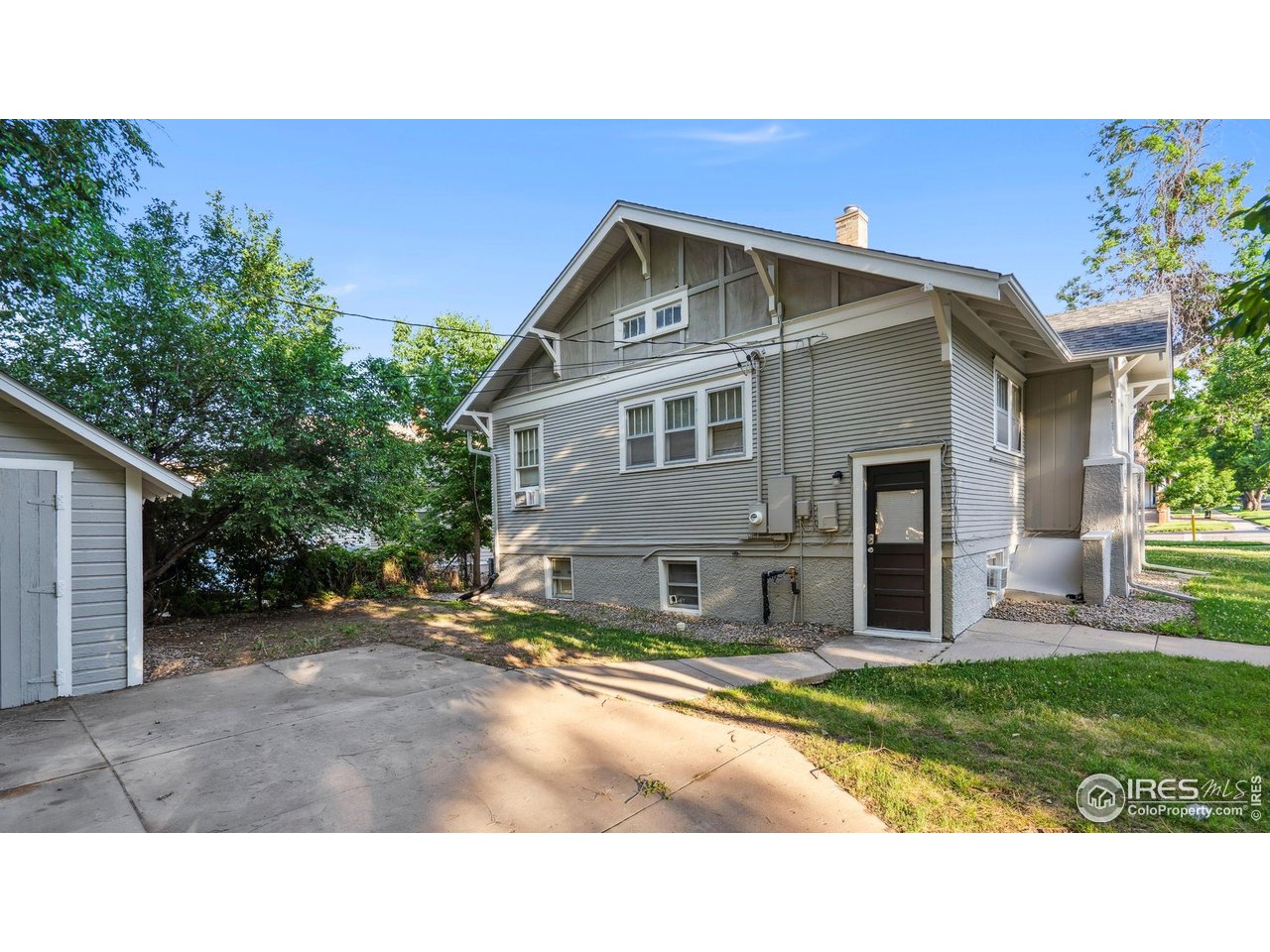 1029 Cranford Place Greeley, CO 80631 - Photo 30 of 34 a house view with a outdoor space