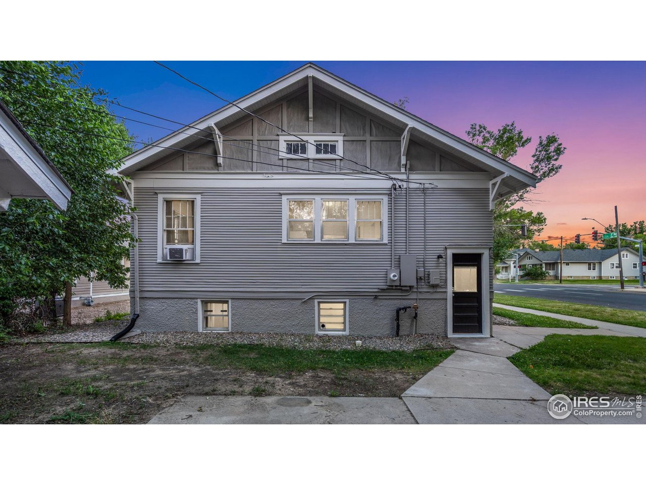 1029 Cranford Place Greeley, CO 80631 - Photo 33 of 34 a front view of a house with garden