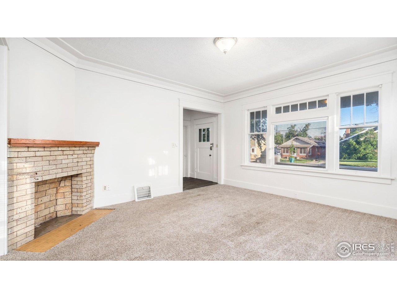 1029 Cranford Place Greeley, CO 80631 - Photo 7 of 34 a black and white photo of a living room