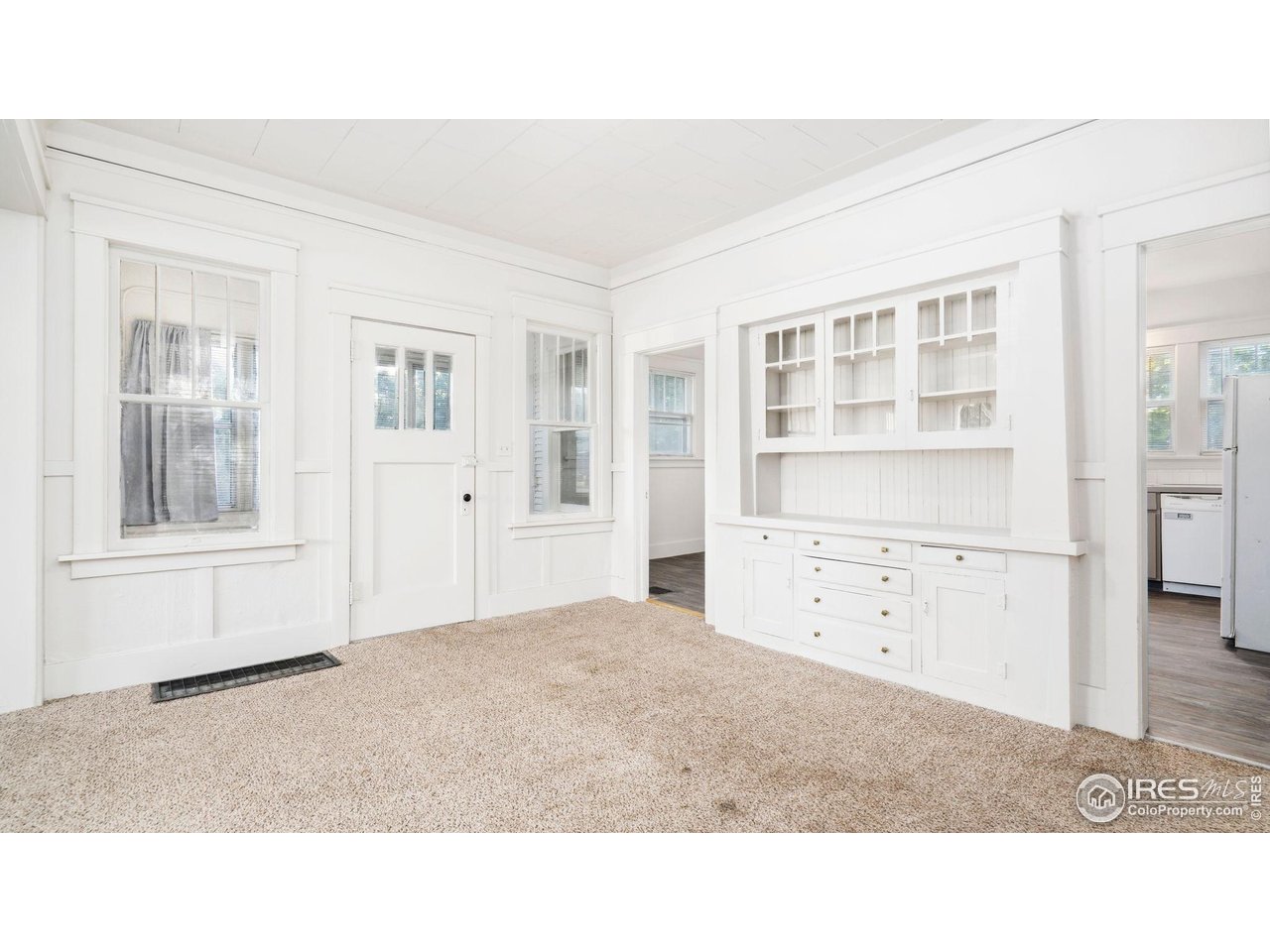 1029 Cranford Place Greeley, CO 80631 - Photo 9 of 34 a black and white photo of a bedroom