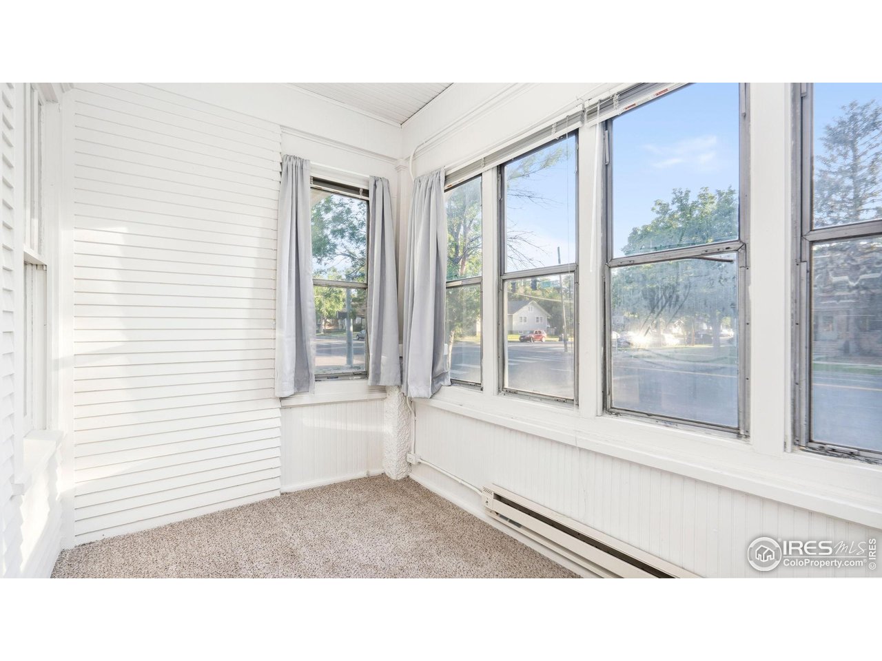 1029 Cranford Place Greeley, CO 80631 - Photo 10 of 34 a black and white photo of a living room