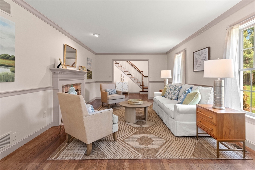 25 Dana Road Boxford, MA 01921 - Photo 18 of 41 a living room with furniture a rug a lamp and a window