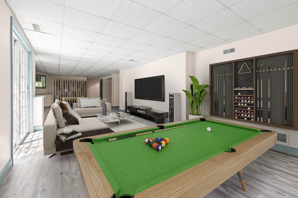 25 Dana Road Boxford, MA 01921 - Photo 34 of 41 a living room with furniture and a flat screen tv