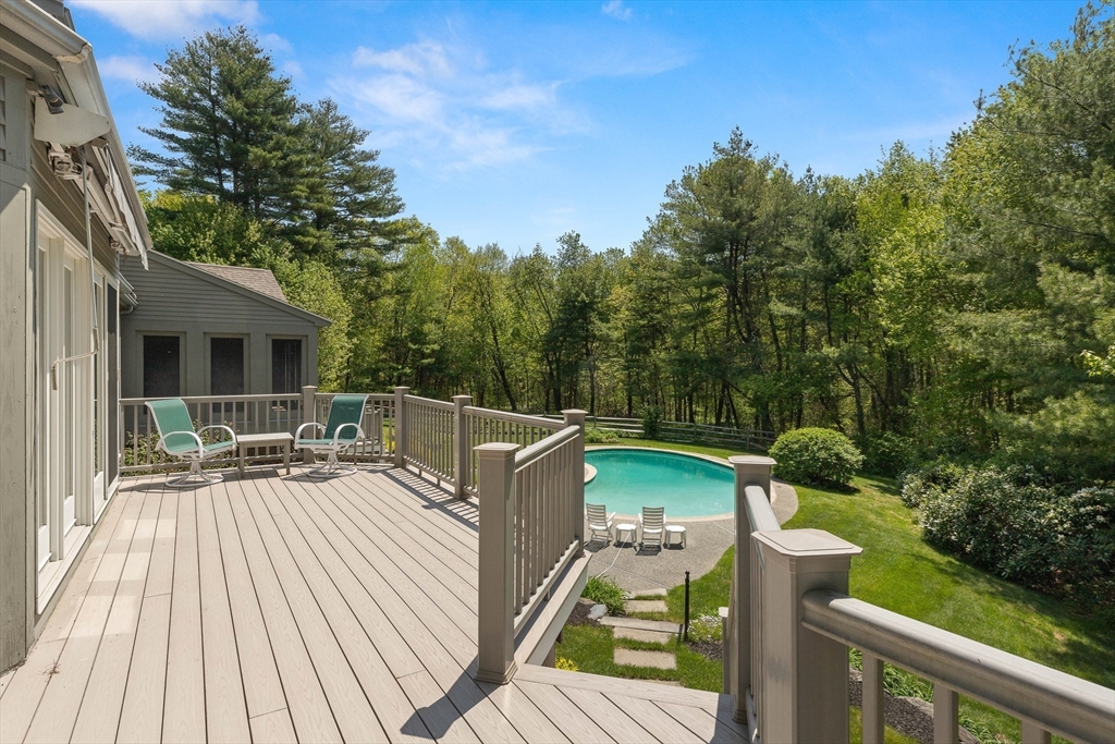 25 Dana Road Boxford, MA 01921 - Photo 36 of 41 a view of a deck with furniture and trees