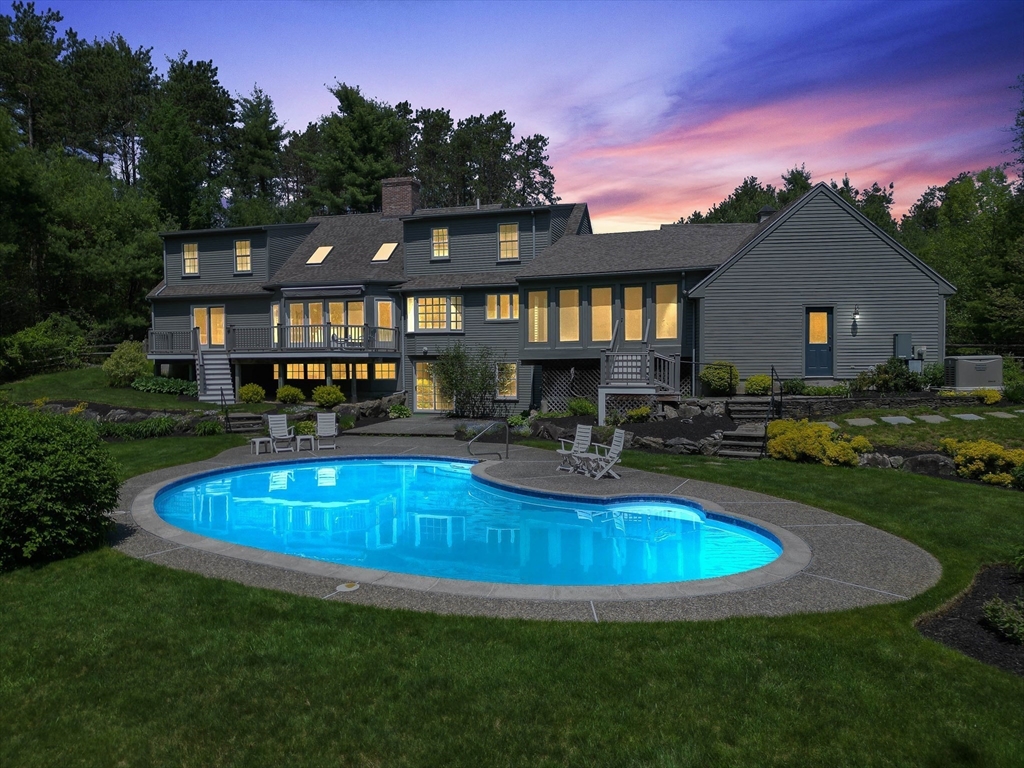 25 Dana Road Boxford, MA 01921 - Photo 41 of 41 a view of a house with swimming pool and sitting area