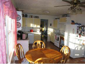 752 Barnhart Road Fort Defiance, VA 24437 - Photo 3 of 8 a dining room with furniture and a chandelier