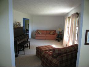 752 Barnhart Road Fort Defiance, VA 24437 - Photo 4 of 8 a living room with furniture and a flat screen tv